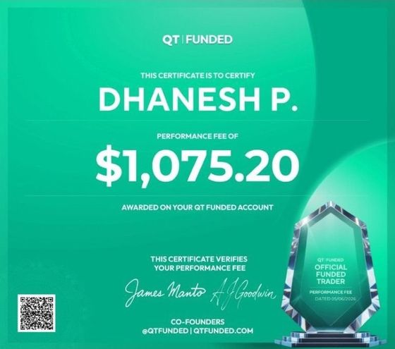 QT Funded official payout certificate — Dhanesh P., performance fee $1,075.20, co-signed by James Manto and A.J. Goodwin