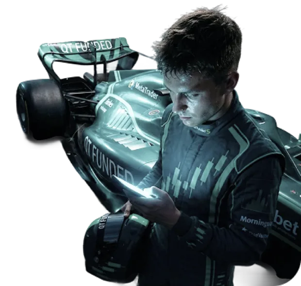 QT Funded liveried Formula-style race car with a driver in a candlestick-pattern racing suit checking trade signals on his phone