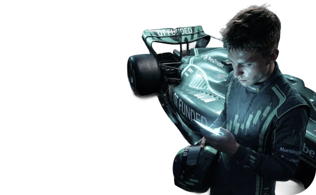 QT Funded liveried Formula-style race car with a driver in a candlestick-pattern racing suit checking trade signals on his phone